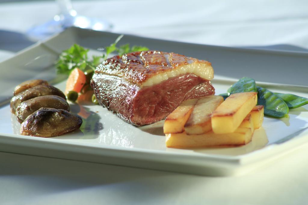 Saint-Pardoux-l'Ortigier Hotel Restaurant Les Coquelicots, The Originals Relais מראה חיצוני תמונה